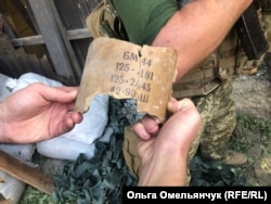 Маркування на залишках снарядів, що підтверджує: контрольовані Росією бойовики застосували у районі Донецького аеропорту заборонений Мінськими домовленостями калібр 125-мм