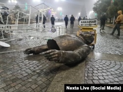 A monument to former President Nursultan Nazarbaev was demolished by protesters in Taldyqorghan.