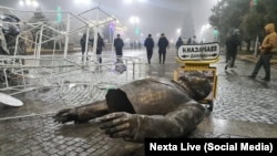 A demolished statue of former Kazakh President Nursultan Nazarbaev in Taldyqorghan.