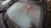 A bullet-riddled and blood-stained windscreen following clashes in the central square in Almaty on January 10.