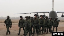 Belarusian troops arrive at an airfield in Kazakhstan as part of the CSTO mission on January 8.