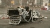 A burned-out cars lies upside down on a square in central Almaty following violence in Kazakhstan's largest city on January 6.