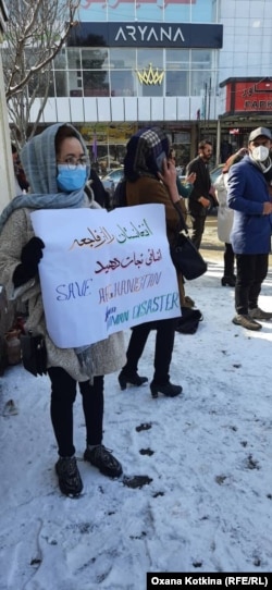 Owgan bosgunlarynyň talyp režimine garşy protesti, ABŞ, Boston. 2021-nji ýylyň dekabry.