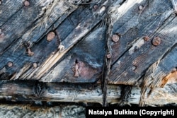 A detail of a North Korean fishing vessel washed ashore in eastern Russia