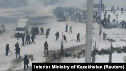 Demonstrators clash with police in Aqtobe on January 5.