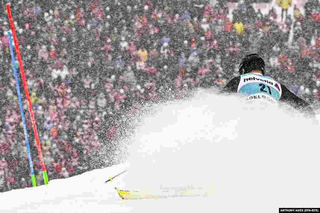 Aleksandr Khoroshilov of Russia clears a gate during a men&#39;s slalom race at the FIS Alpine Skiing World Cup in Adelboden, Switzerland.