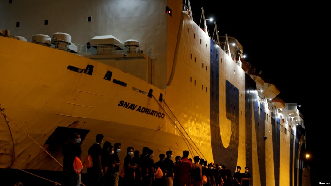 Fotoarhiv: Migranti stižu na Siciliju u Italiji, avgust 2021.
