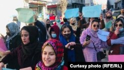 Afghan women protest against the mandatory hijab imposed by the Taliban.