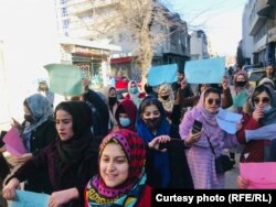 Afghan women protest against the Taliban's mandate of mandatory hijab on January 11.