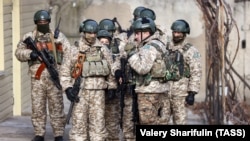 Kazakhstan -- Armenian servicemen guard the Druzhba [Friendship] water pump station in Almaty, January 12, 2022.