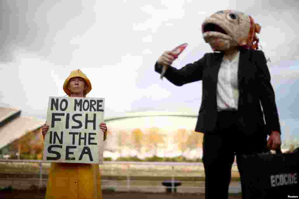 Ocean Rebellion activists protest against destructive industrial fishing during the UN Climate Change Conference (COP26), in Glasgow, Scotland, Britain, November 4, 2021