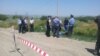 Armenia - Law-enforcement officials inspect the site of the murder of Russian serviceman Ivan Novikov in Gyumri, 15 June, 2015