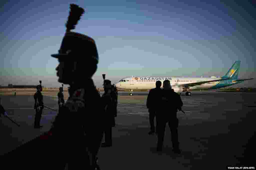 Kazakh President Qasym-Zhomart Tokaev arrives by plane at Orly Airport, outside Paris, on November 4. Tokaev is on a two-day state visit to France and will meet French President Macron on November 5.