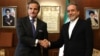 IAEA chief Rafael Grossi (left) meets with Iranian Foreign Minister Abbas Araqchi in Tehran on November 14.