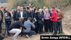 European Commission President Ursula von der Leyen observes destruction following storms during a visit to Jablanica, Bosnia-Herzegovina, on October 23.