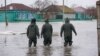 Kazakh rescue workers seek to evacuate residents from the flooded settlement of Pokrovka in northern Kazakhstan, close to the border with Russia, a region that has been badly affected by floods in recent weeks. 