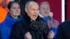 Russian President Vladimir Putin gestures while addressing a crowd at a concert marking his victory in a presidential election and the 10th anniversary of Russia's illegal annexation of Crimea on Red Square in Moscow on M arch 18. 