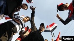 Supporters of Iraqi cleric Muqtada al-Sadr demonstrate in Baghdad on February 8.