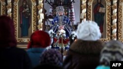 Archbishop Klyment (center) from Ukraine's independent Orthodox Church leads a service in Simferopol last month. 