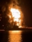 Oil Tankers Ablaze In Gulf After Iranian Drone Boat Attack
GRAB 1