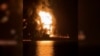Oil Tankers Ablaze In Gulf After Iranian Drone Boat Attack
GRAB 1