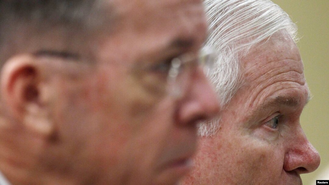 U.S. Secretary of Defense Robert Gates (right) and Admiral Michael Mullen at a hearing in Washington today.