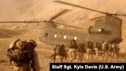 FILE: U.S. troops boarding a Chinook helicopter in Kandahar, Afghanistan.