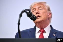 US President Donald Trump addresses the media during a closing press conference at the G7 summit in Evian, France, on June 17.