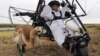 Russian President Vladimir Putin prepares to take part in a scientific experiment as part of the "Flight of Hope," which aims to preserve a rare species of cranes, in September 2012.