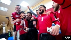 Игроки сборной Грузии после победы