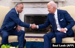 Američki predsjednik Joe Biden na sastanku sa iračkim pemijerom Mustafom Al-Kadhimijem (lijevo) na sastanku u Bijeloj kući, 26. juli 2021.