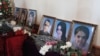 Armenia - Flowers put by the pictures of six members of an Armenian family murdered in Gyumri during their funeral, 15Jan2015.