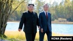 Președinții celor două state coreene, Moon Jae-in și Kim Jong Un, 21 septembrie 2018.