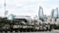 Azerbaijan -- A column of military vehicles rolls during a rehearsal of a military parade in Baku, 21Jun2013