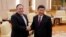 U.S. Secretary of State Mike Pompeo (L) meets wwith Chinese President Xi Jinping at the Great Hall of the People in Beijing, June 14, 2018