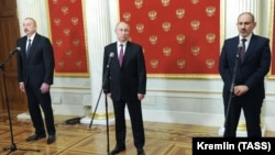 RUSSIA -- Russian President Vladimir Putin, Azerbaijani President Ilham Aliyev and Armenian Prime Minister Nikol Pashinian attend a joint press conference following a trilateral meeting at the Kremlin in Moscow, January 11, 2021