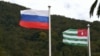Флаги России и Абхазии, архивная фотография