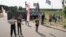 Protesters rally against building of a restaurant near Kurapaty memorial to the victims of Stalinist repressions on June 25.