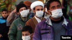 Residents of Qom, the epicenter of coronavirus outbreak in Iran, waiting to be examined by a mobile medical team. February 27, 2020. 