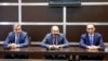 Armenia - Prime Minister Nikol Pashinian (C), the newly appointed chief of the State Revenue Committee, Davit Ananian (L), and his predecessor Vartan Haritunian meet senior SRC officials, Yerevan, 18 May 2018.