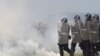Kosovo Security Forces and NATO troops conduct a joint crowd and riot control drill in Pristina.