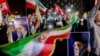 تجمع گروهی از طرفداران جمهوری اسلامی در خیابانی در تهران به مناسبت عید موسوم به «نیمه شعبان» 