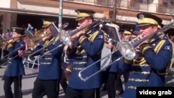 A band performs in Pristina during anniversary celebrations.