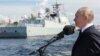 Russia's President Vladimir Putin speaks at a Navy Day parade in St Petersburg on July 28. 