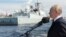 Russia's President Vladimir Putin speaks at a Navy Day parade in St Petersburg on July 28. 