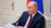 Russian President Vladimir Putin attends a video call of an investment forum in Moscow on November 30.