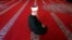 The head of Bosnia's Muslim Community, Grand Mufti Husein Kavazovic, prays alone in the Gazi Husrev Bay Mosque in Sarajevo on April 24.