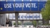 Bannere care arată mesajul „Folosește-ți votul” pentru viitoarele alegeri europene, din 6-9 iunie 2024, sunt ridicate în apropiere de Parlamentul UE din Bruxelles, Belgia.