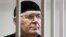 Чеченский правозащитник Оюб Титиев в зале суда