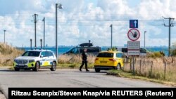 Danska policija na aerodromu u Kastrupu blizu Kopenhagena, 22. septembra 2025. 